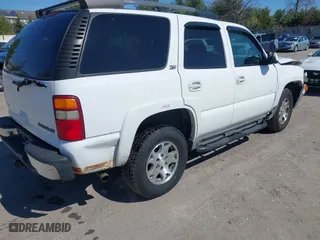 2003 Chevrolet Tahoe Z71 with VIN 1GNEK13Z63R228530, listed as a IAAI auction lot 41996750 with 220,916 mi miles. Bid and sale history available at carsss.com. Image 4.