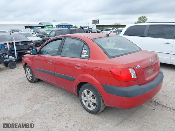 2008 Kia Rio LX with VIN KNADE123386354410, listed as a IAAI auction lot 40332735 with 139,828 mi miles. Bid and sale history available at carsss.com. Image 3.