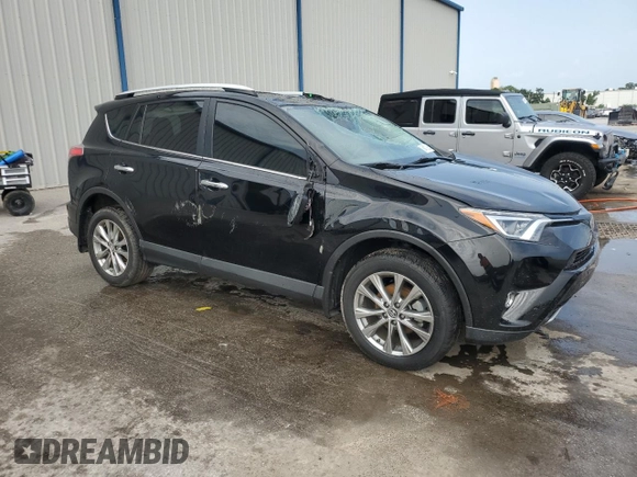2016 Toyota RAV4 Limited with VIN 2T3DFREV2GW471288, listed as a Copart auction lot 59413885 with 50,023 mi miles and Salvage title. Bid and sale history available at DreamBid. Image 4.