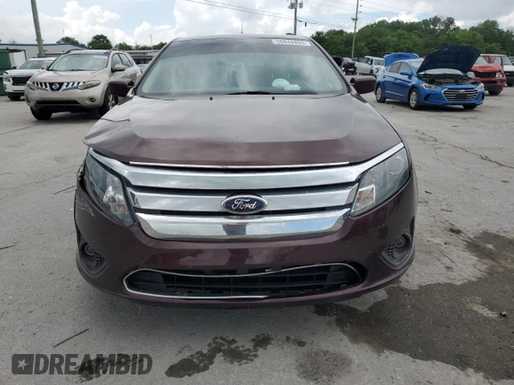 2012 Ford Fusion SE with VIN 3FAHP0HA1CR184497, listed as a Copart auction lot 56848805 with 217,189 mi miles and Clean title. Bid and sale history available at DreamBid. Image 5.