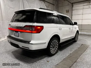 2021 Lincoln Navigator Reserve with VIN 5LMJJ2LT4MEL11001, listed as a Copart auction lot 54712665 with 34,120 mi miles and Clean Title. Bid and sale history available at carsss.com. Image 4.