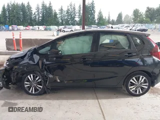 2015 Honda Fit EX-L z VIN 3HGGK5H81FM701122, wystawiony jako IAAI lot #42610165 z przebiegiem 74 969 mil mil oraz . Historia ofert i sprzedaży dostępna na DreamBid. Obrazek 15.