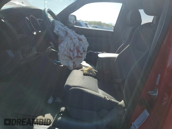 2005 Toyota Tacoma with VIN 5TEUU42N45Z093795, listed as a Copart auction lot 52331665 with 243,681 mi miles and Salvage Title. Bid and sale history available at DreamBid. Image 7.