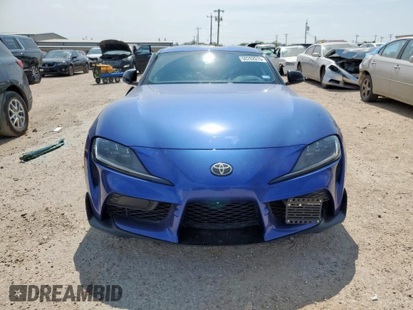 2023 Toyota Supra 3.0 with VIN WZ1DB0G05PW054758, listed as a Copart auction lot 60202015 with 32,974 mi miles and Salvage title. Bid and sale history available at DreamBid. Image 5.