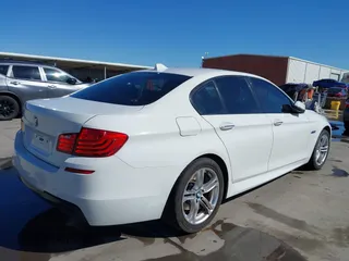 2014 BMW 5 Series 528i with VIN WBA5A5C50ED503130, listed as a IAAI auction lot 41819922 with 135,923 mi miles. Bid and sale history available at carsss.com. Image 4.
