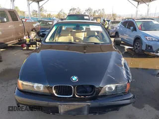 2000 BMW 5 Series 528iA with VIN WBADM6343YGU12629, listed as a IAAI auction lot 41963814 with 206,922 mi miles. Bid and sale history available at carsss.com. Image 12.
