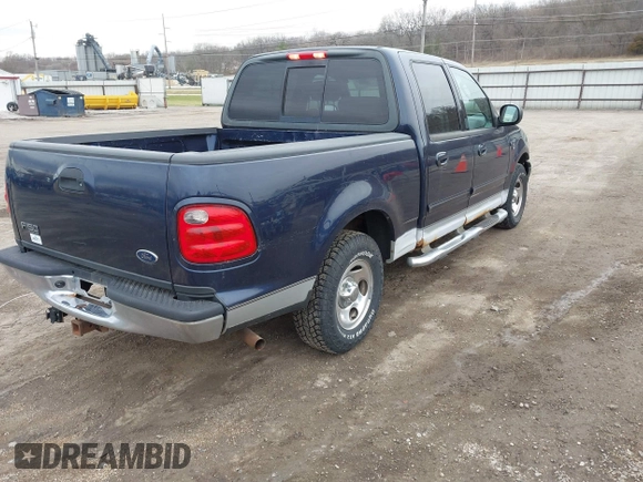 2003 Ford F-150 XLT with VIN 1FTRW07L63KD51221, listed as a IAAI auction lot 41883942 with Not Provided miles. Bid and sale history available at carsss.com. Image 4.