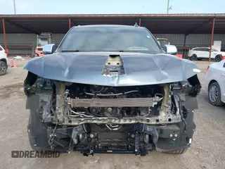 2021 Chevrolet Suburban Premier with VIN 1GNSKFKDXMR295929, listed as a IAAI auction lot 42033006 with 46,733 mi miles and . Bid and sale history available at DreamBid. Image 12.