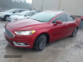 2018 Ford Fusion Titanium with VIN 3FA6P0D91JR233679, listed as a IAAI auction lot 42182140 with 100,706 mi miles and . Bid and sale history available at DreamBid. Image 17.