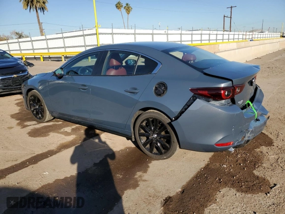 2025 Mazda 3 S Carbon Edition with VIN 3MZBPBCM7SM458520, listed as a Copart auction lot 44171065 with 2,214 mi miles and Clean Title. Bid and sale history available at DreamBid. Image 2.