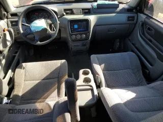 1997 Honda CR-V with VIN JHLRD1843VC018932, listed as a Copart auction lot 77965544 with 204,861 mi miles and Salvage Title. Bid and sale history available at carsss.com. Image 8.