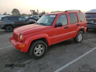 2002 Jeep Liberty Limited with VIN 1J4GK58K32W108098, listed as a Copart auction lot 83675464 with 143,209 mi miles and Salvage title. Bid and sale history available at DreamBid. Image 1.