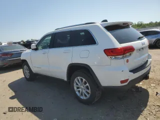 2016 Jeep Grand Cherokee Laredo with VIN 1C4RJEAG4GC500524, listed as a Copart auction lot 61613725 with 122,467 mi miles and Salvage title. Bid and sale history available at DreamBid. Image 2.