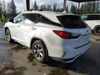 2018 Lexus RX 350L Premium z VIN JTJDZKCA5J2008427, wystawiony jako IAAI lot #41651433 z przebiegiem 51 216 mil mil oraz . Historia ofert i sprzedaży dostępna na DreamBid. Obrazek 3.