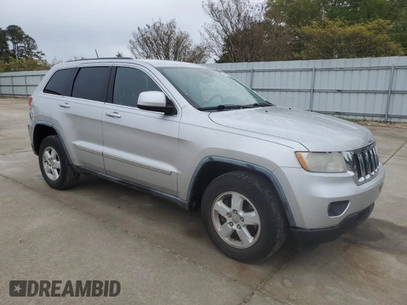 2012 Jeep Grand Cherokee Laredo with VIN 1C4RJEAG9CC190378, listed as a Copart auction lot 51120365 with 172,156 mi miles and Salvage Title. Bid and sale history available at carsss.com. Image 4.