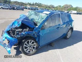 2012 Mazda Mazda3 i Touring with VIN JM1BL1L70C1674419, listed as a IAAI auction lot 40902429 with Not Provided miles. Bid and sale history available at carsss.com. Image 2.