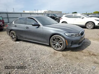 2020 BMW 3 Series 330i with VIN 3MW5R1J01L8B05802, listed as a Copart auction lot 52021825 with 86,214 mi miles and Salvage title. Bid and sale history available at DreamBid. Image 4.