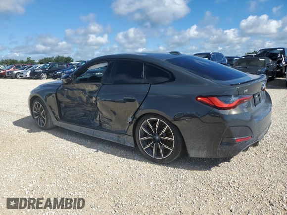 2023 BMW i4 eDrive40 with VIN WBY73AW00PFN90032, listed as a Copart auction lot 59993324 with 15,913 mi miles and Non Repairable. Bid and sale history available at carsss.com. Image 2.