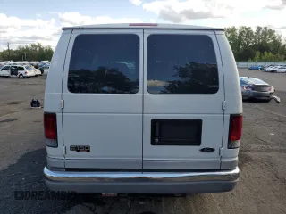 2002 Ford Econoline Passenger XL with VIN 1FMRE11WX2HA57114, listed as a Copart auction lot 68766174 with 167,382 mi miles and Salvage Title. Bid and sale history available at DreamBid. Image 6.
