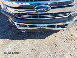 2020 Ford F-150 XL with VIN 1FTEW1EP0LKE90657, listed as a IAAI auction lot 40784955 with 64,978 mi miles and . Bid and sale history available at DreamBid. Image 6.
