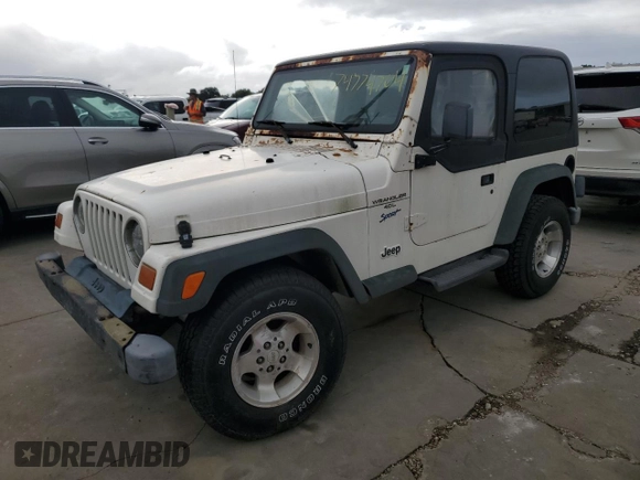 1997 Jeep Wrangler Sport with VIN 1J4FY19S9VP430180, listed as a Copart auction lot 74774704 with 0 mi miles and Salvage Title. Bid and sale history available at carsss.com. Image 1.