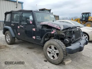 2015 Jeep Wrangler Unlimited Willys Wheeler with VIN 1C4BJWDG3FL601197, listed as a Copart auction lot 53832465 with 216,141 mi miles and Salvage Title. Bid and sale history available at DreamBid. Image 4.