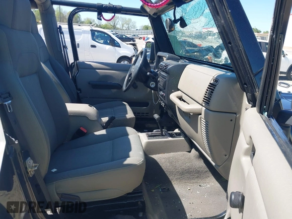 2004 Jeep Wrangler Sahara with VIN 1J4FA59S74P801296, listed as a IAAI auction lot 42049291 with 152,208 mi miles and . Bid and sale history available at DreamBid. Image 5.