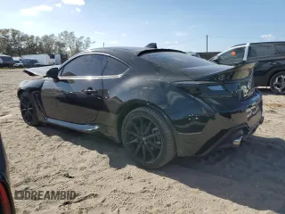 2023 Toyota GR86 Premium with VIN JF1ZNBE18P9753292, listed as a Copart auction lot 76885564 with 6,680 mi miles and Salvage Title. Bid and sale history available at carsss.com. Image 2.