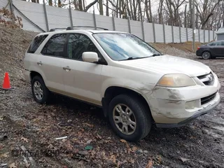 2004 Acura MDX Touring Pkg RES w/Nav with VIN 2HNYD18974H549920, listed as a IAAI auction lot 41696166 with 264,868 mi miles. Bid and sale history available at carsss.com. Image 1.