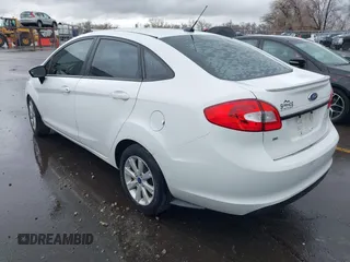 2012 Ford Fiesta SE with VIN 3FADP4BJ8CM102695, listed as a IAAI auction lot 41734833 with 131,779 mi miles. Bid and sale history available at carsss.com. Image 3.