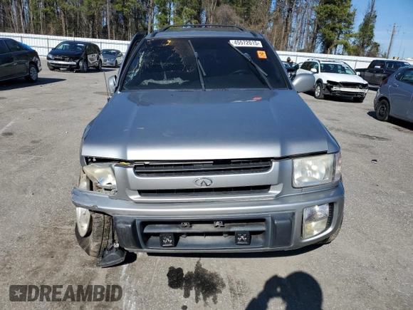 2000 Infiniti QX4 with VIN JNRAR07Y1YW077992, listed as a Copart auction lot 45572015 with 202,385 mi miles and Salvage Title. Bid and sale history available at DreamBid. Image 5.
