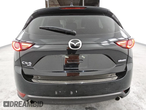 2021 Mazda CX-5 Grand Touring with VIN JM3KFBDM6M0487606, listed as a Copart auction lot 45399655 with 25,241 mi miles and Clean Title. Bid and sale history available at DreamBid. Image 6.