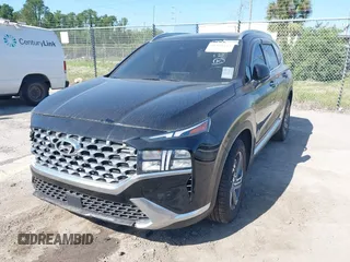 2021 Hyundai Santa Fe SEL with VIN 5NMS34AJXMH307065, listed as a IAAI auction lot 41951232 with 32,305 mi miles. Bid and sale history available at carsss.com. Image 2.