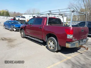 2007 Toyota Tundra SR5 with VIN 5TBDV54117S487602, listed as a IAAI auction lot 42106287 with 214,725 mi miles. Bid and sale history available at carsss.com. Image 3.