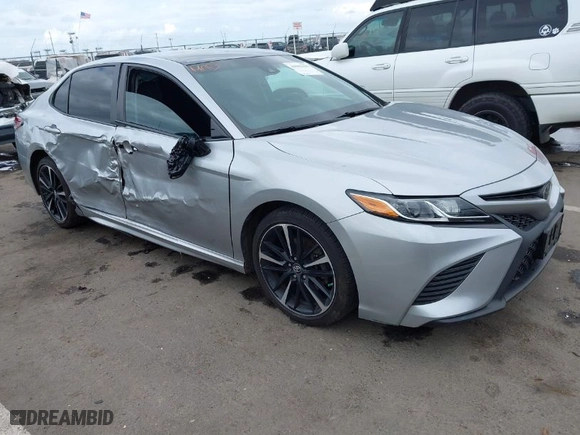 2018 Toyota Camry LE with VIN 4T1B11HK0JU129623, listed as a IAAI auction lot 41902335 with 100,643 mi miles. Bid and sale history available at carsss.com. Image 1.