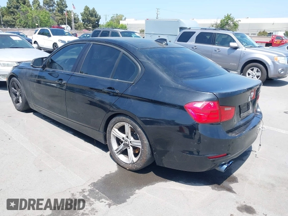 2013 BMW 3 Series 328i with VIN WBA3A5C52DF352107, listed as a IAAI auction lot 42169521 with 125,141 mi miles. Bid and sale history available at carsss.com. Image 3.