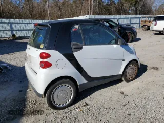 2012 Smart fortwo Pure z VIN WMEEJ3BA1CK559092, wystawiony jako Copart lot #85506924 z przebiegiem 47 806 mil mil oraz Szkoda całkowita • Salvage title. Historia ofert i sprzedaży dostępna na DreamBid. Obrazek 3.