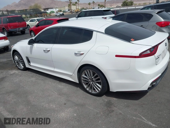 2018 Kia Stinger with VIN KNAE15LA8J6031125, listed as a IAAI auction lot 41928665 with 82,003 mi miles. Bid and sale history available at carsss.com. Image 3.