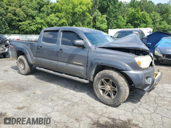 2014 Toyota Tacoma with VIN 5TFMU4FN3EX025697, listed as a Copart auction lot 62146895 with 133,028 mi miles and Salvage title. Bid and sale history available at DreamBid. Image 4.