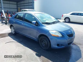 2012 Toyota Yaris with VIN JTDBT4K35C1418311, listed as a IAAI auction lot 41799905 with 201,457 mi miles. Bid and sale history available at carsss.com. Image 1.