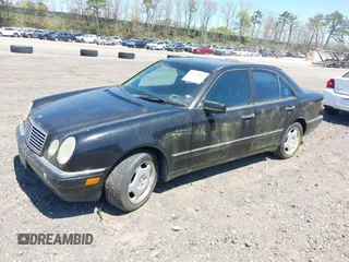 1997 Mercedes-Benz E-Class with VIN WDBJF72F8VA309745, listed as a IAAI auction lot 42119469 with 131,318 mi miles. Bid and sale history available at carsss.com. Image 2.