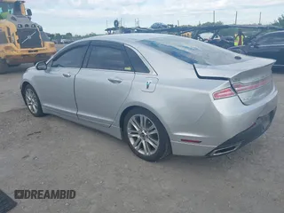 2014 Lincoln MKZ with VIN 3LN6L2GK5ER823529, listed as a IAAI auction lot 42221147 with 151,751 mi miles and . Bid and sale history available at DreamBid. Image 3.