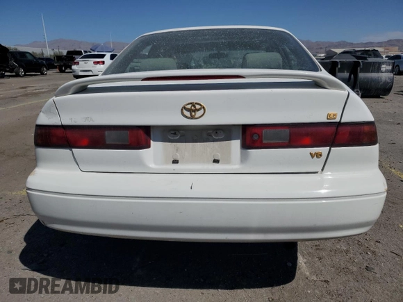 1998 Toyota Camry LE z VIN JT2BF28K3W0115122, wystawiony jako Copart lot #52645095 z przebiegiem 361 549 mil mil oraz Szkoda całkowita • Salvage title. Historia ofert i sprzedaży dostępna na DreamBid. Obrazek 6.