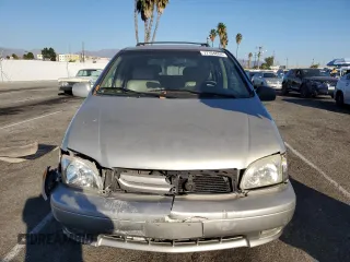 2002 Toyota Sienna LE with VIN 4T3ZF13C52U505287, listed as a Copart auction lot 77164884 with 0 mi miles and Salvage Title. Bid and sale history available at carsss.com. Image 5.