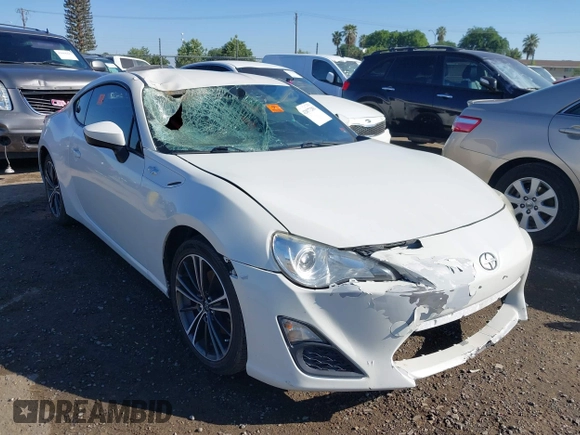 2016 Scion FR-S with VIN JF1ZNAA19G9709205, listed as a IAAI auction lot 42077281 with 68,549 mi miles. Bid and sale history available at carsss.com. Image 1.