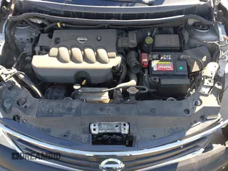 2010 Nissan Versa S with VIN 3N1BC1CP2AL377564, listed as a IAAI auction lot 41383636 with 200,798 mi miles and . Bid and sale history available at DreamBid. Image 10.