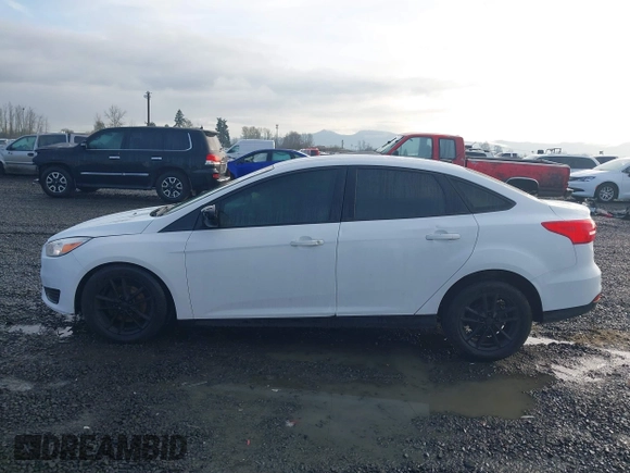 2018 Ford Focus SE with VIN 1FADP3F23JL242066, listed as a IAAI auction lot 41804512 with 99,662 mi miles. Bid and sale history available at carsss.com. Image 14.