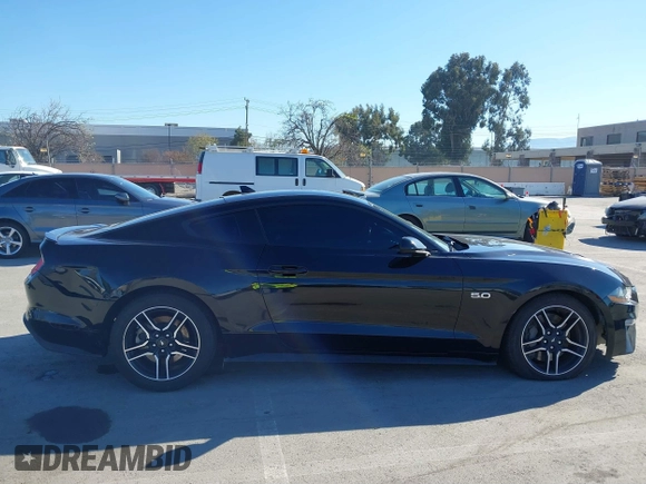 2021 Ford Mustang GT z VIN 1FA6P8CF6M5149175, wystawiony jako IAAI lot #41798328 z przebiegiem 61 776 mil mil oraz . Historia ofert i sprzedaży dostępna na DreamBid. Obrazek 13.