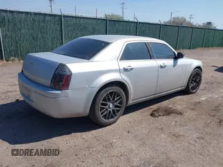 2007 Chrysler 300 with VIN 2C3KA43R67H664434, listed as a IAAI auction lot 41884172 with 238,451 mi miles. Bid and sale history available at carsss.com. Image 4.