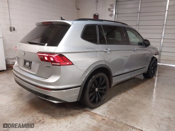 2021 Volkswagen Tiguan SE with VIN 3VV2B7AX1MM013884, listed as a IAAI auction lot 41313293 with 40,489 mi miles. Bid and sale history available at carsss.com. Image 4.